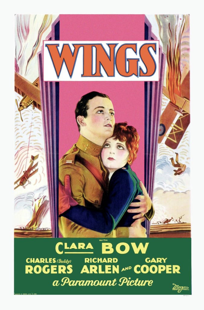 Wings, poster, from left, Charles 'Buddy' Rogers, Clara Bow, 1927. (Photo by LMPC via Getty Images)