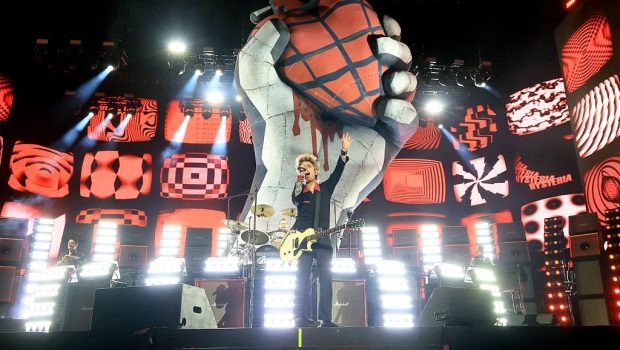 INDIO, CALIFORNIA - APRIL 19: (FOR EDITORIAL USE ONLY) (L-R) Tré Cool, Billie Joe Armstrong and Mike Dirnt of Green Day perform at the Coachella Stage during the 2025 Coachella Valley Music and Arts Festival on April 19, 2025 in Indio, California. (Photo by Kevin Mazur/Getty Images for Coachella)