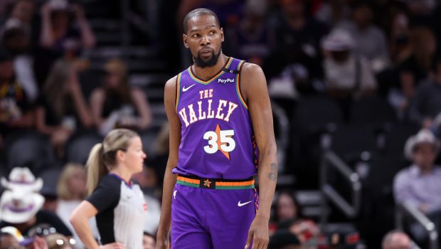 PHOENIX, ARIZONA - MARCH 30: Kevin Durant #35 of the Phoenix Suns looks on during the second half against the Houston Rockets at PHX Arena on March 30, 2025 in Phoenix, Arizona. The Rockets defeated the Suns 148-109. NOTE TO USER: User expressly acknowledges and agrees that, by downloading and or using this photograph, User is consenting to the terms and conditions of the Getty Images License Agreement. (Photo by Chris Coduto/Getty Images)