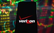 POLAND - 2023/09/19: In this photo illustration, a Verizon logo seen displayed on a smartphone with stock market percentages in the background. (Photo Illustration by Omar Marques/SOPA Images/LightRocket via Getty Images)