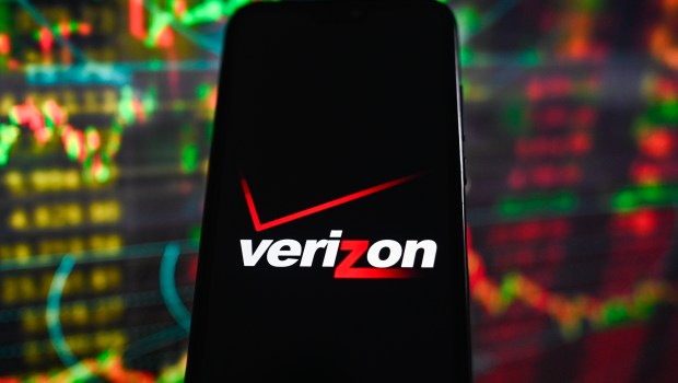 POLAND - 2023/09/19: In this photo illustration, a Verizon logo seen displayed on a smartphone with stock market percentages in the background. (Photo Illustration by Omar Marques/SOPA Images/LightRocket via Getty Images)