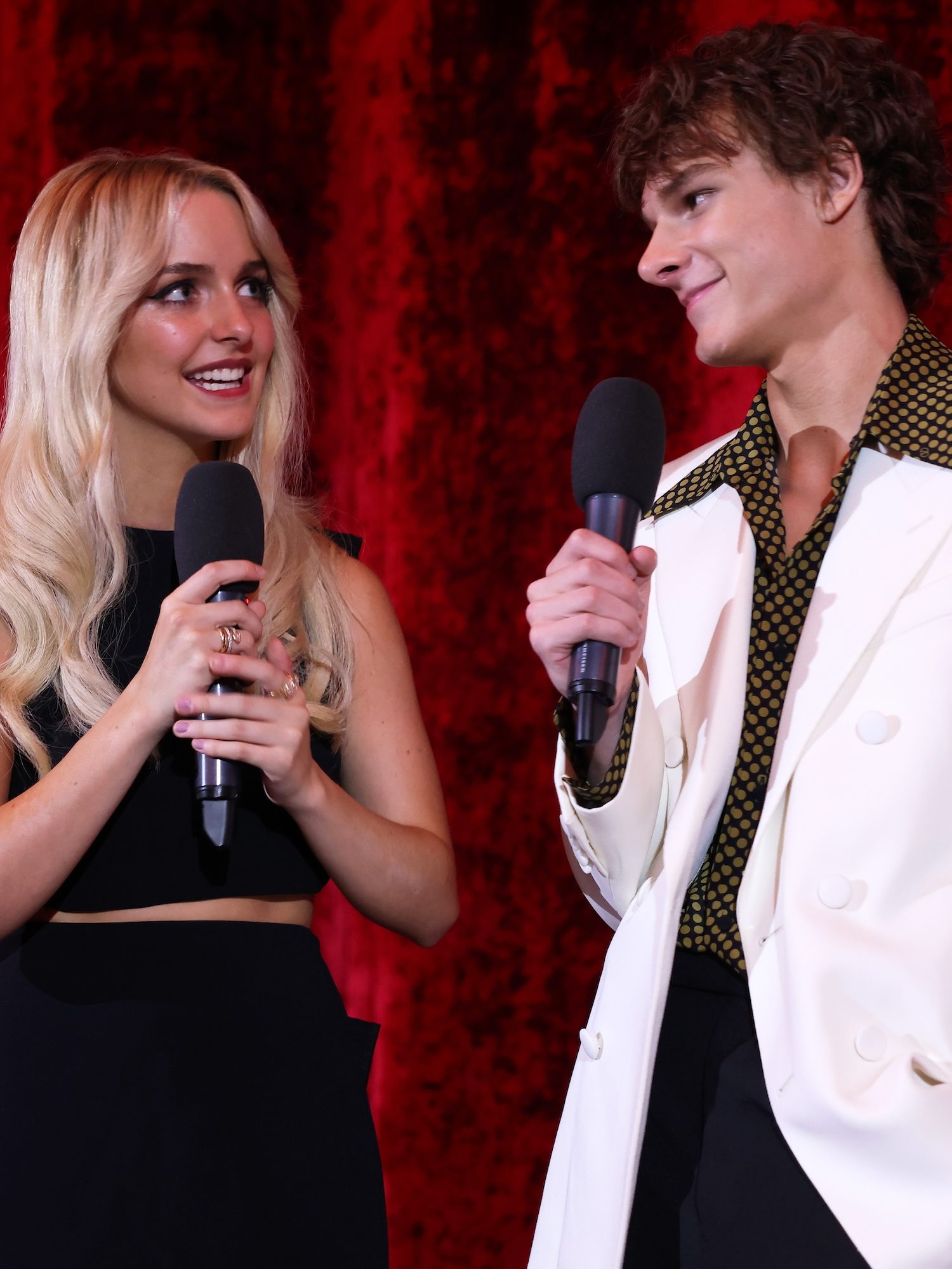 BERLIN, GERMANY - OCTOBER 12: Mckenna Grace and Mason Thames speak on stage at the "Regretting You" Berlin Special Screening at Zoo Palast on October 12, 2025, in Berlin, Germany. (Photo by Gerald Matzka/Getty Images for Paramount Pictures)