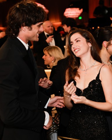 Jacob Elordi and Ana de Armas at the 83RD ANNUAL GOLDEN GLOBES®, airing live from the Beverly Hilton in Beverly Hills, California on Sunday, January 11, 2026 at 8 PM ET/5 PM PT, on CBS and streaming on Paramount+. Photo: Francis Specker/CBS ©2026 CBS Broadcasting, Inc. All Rights Reserved.
