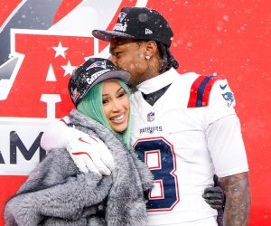 DENVER, COLORADO - JANUARY 25: Cardi B and Stefon Diggs #8 of the New England Patriots pose for a portrait after the AFC Championship game against the Denver Broncos at Empower Field At Mile High on January 25, 2026 in Denver, Colorado. (Photo by Lauren Leigh Bacho/Getty Images)