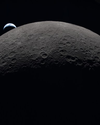 Artemis 2 Photos: Pictures of the Moon, Earthset, Eclipse & More Earth sets at 6:41 p.m. EDT, April 6, 2026, over the Moon’s curved limb in this photo captured by the Artemis II crew during their journey around the far side of the Moon.