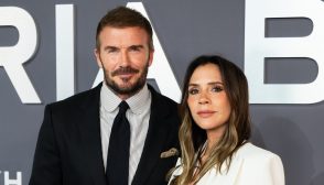 David Beckham - Victoria Beckham plants a kiss on husband David's cheek as he kicks off his 51st