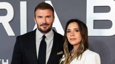 David Beckham - Victoria Beckham plants a kiss on husband David's cheek as he kicks off his 51st