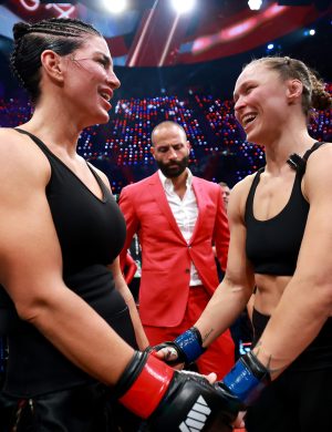 INGLEWOOD, CALIFORNIA - MAY 16: Ronda Rousey and Gina Carano embrace after their featherweight bout during the main card of Netflix's Ronda Rousey vs. Gina Carano at Intuit Dome on May 16, 2026 in Inglewood, California. (Photo by Sarah Stier/Getty Images for Netflix)