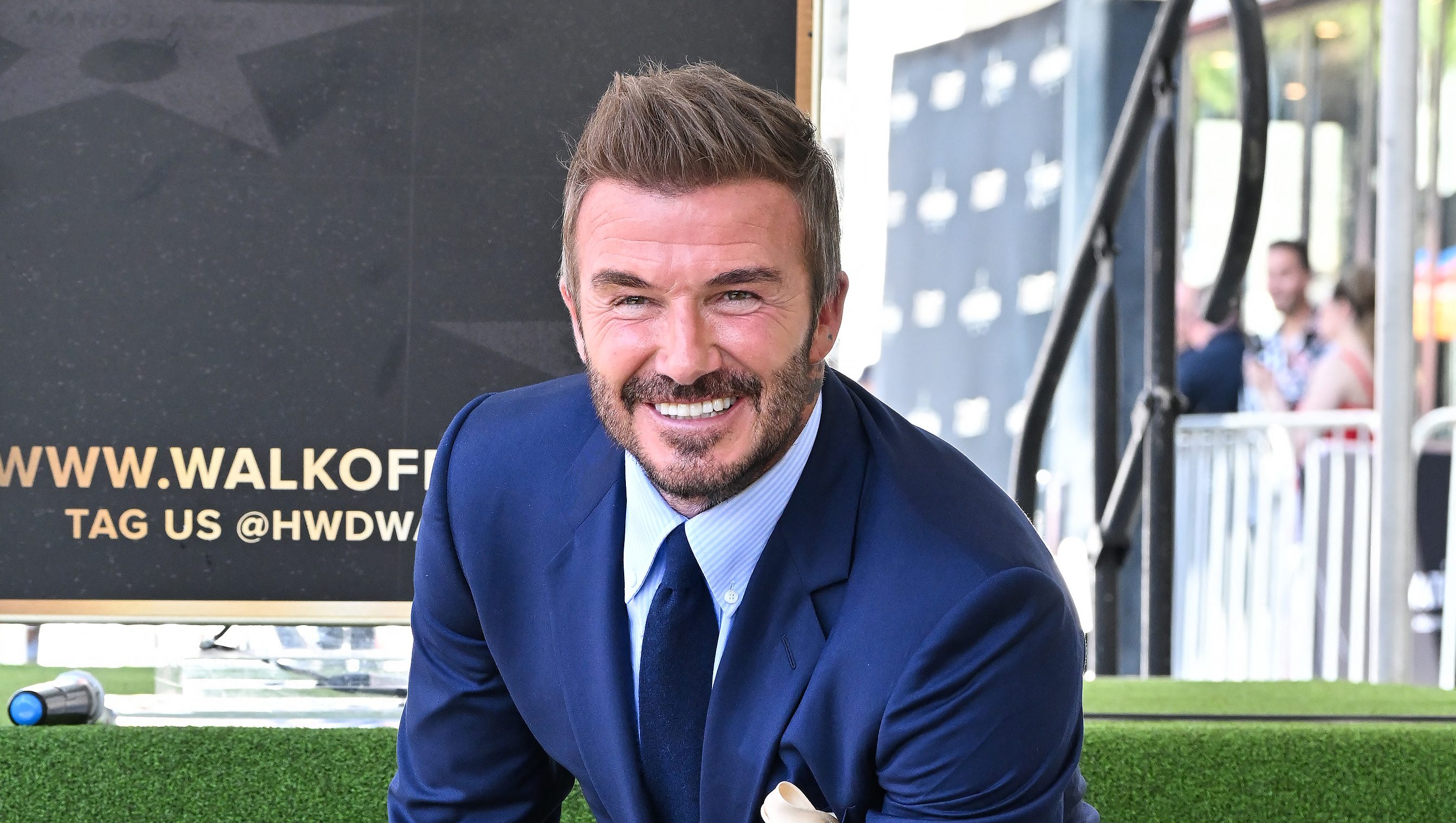 English former footballer David Beckham poses at his newly unveiled Hollywood Walk of Fame star during a ceremony in Hollywood, California, on June 12, 2026. (Photo by LISA O'CONNOR / AFP via Getty Images)