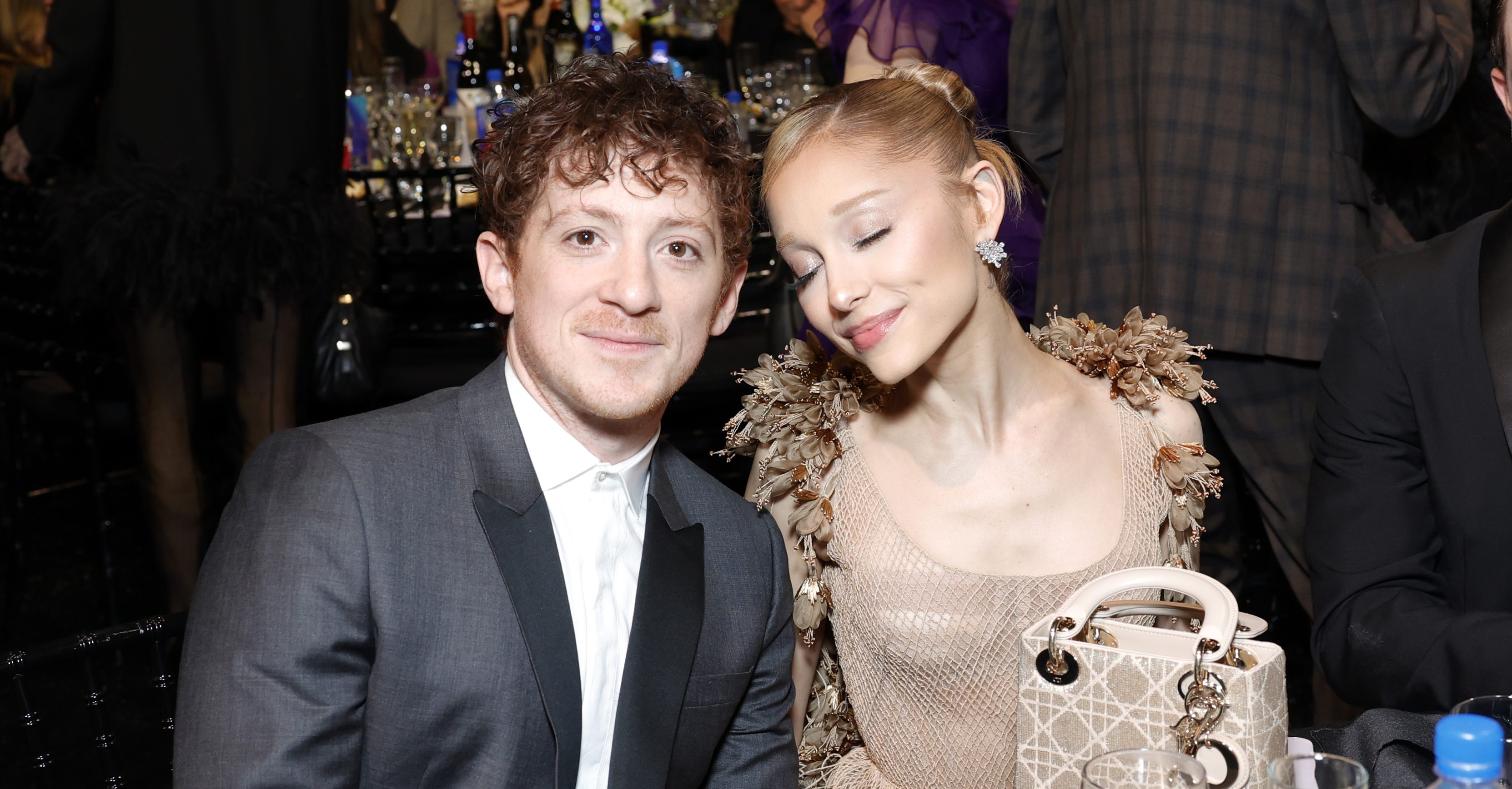 SANTA MONICA, CALIFORNIA - FEBRUARY 07: (L-R) Ethan Slater, Ariana Grande and a guest attend FIJI Water at The 30th Critics Choice Awards at Barker Hangar on February 07, 2025 in Santa Monica, California. (Photo by Stefanie Keenan/Getty Images for FIJI Water)
